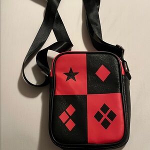 Buckle- Down DC crossbody bag Color red and black Size 6”-3”-8”. NWT